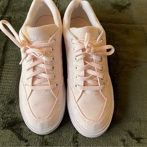 Pink and white womens NIKE shoes